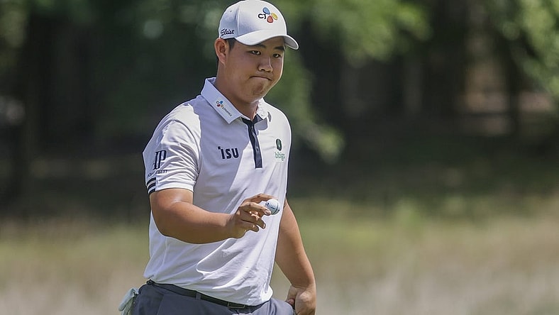 Aug 7, 2022; Greensboro, North Carolina, USA; Joohyung Kim reacts after making a birdie on the eighth hole during the final round of the Wyndham Championship golf tournament. Mandatory Credit: Nell Redmond-USA TODAY Sports