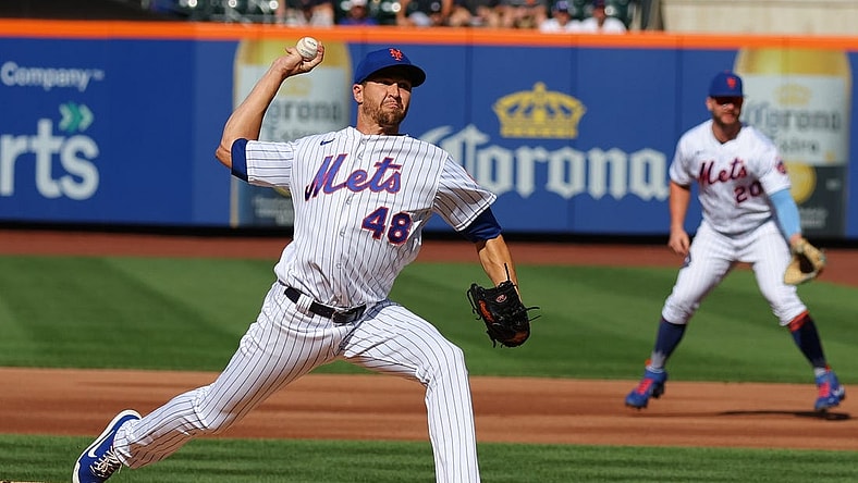 Aug 7, 2022; New York City, New York, USA; New York Mets starting pitcher Jacob deGrom (48) delivers a pitch during the first inning against the Atlanta Braves during the first inning at Citi Field. Mandatory Credit: Vincent Carchietta-USA TODAY Sports