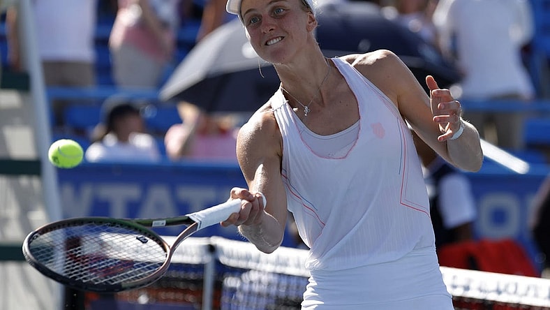 Aug 7, 2022; Washington, DC, USA; Liudmila Samsonova balls celebrates by hitting balls into the stands after her match against Kaia Kanepi (EST) (not pictured) in the women's singles final on day seven of the Citi Open at Rock Creek Park Tennis Center. Mandatory Credit: Geoff Burke-USA TODAY Sports