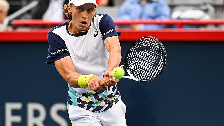 Aug 8, 2022; Montreal, Quebec, Canada; Emil Ruusuvuori (FIN) hits a shot against Stan Wawrinka (SUI) (not pictured) during first round play at IGA Stadium. Mandatory Credit: David Kirouac-USA TODAY Sports