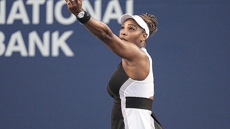 Aug 10, 2022; Toronto, ON, Canada; Serena Williams (USA) serves to Belinda Bencic (not pictured) at Sobeys Stadium. Mandatory Credit: John E. Sokolowski-USA TODAY Sports