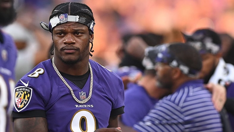 Aug 11, 2022; Baltimore, Maryland, USA;  Baltimore Ravens quarterback Lamar Jackson (8) walks on the sidelines during the first half Tennessee Titans at M&T Bank Stadium. Mandatory Credit: Tommy Gilligan-USA TODAY Sports