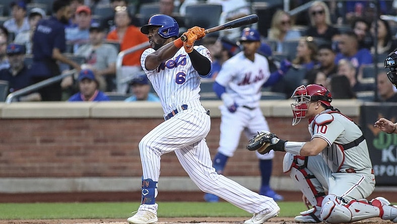Aug 13, 2022; New York City, New York, USA;  New York Mets right fielder Starling Marte (6) hits a single in the first inning against the Philadelphia Phillies at Citi Field. Mandatory Credit: Wendell Cruz-USA TODAY Sports
