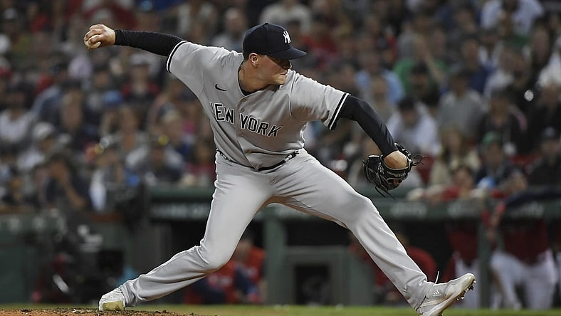 Aug 13, 2022; Boston, Massachusetts, USA;  New York Yankees relief pitcher Scott Effross (59) pitches during the ninth inning against the Boston Red Sox at Fenway Park. Mandatory Credit: Bob DeChiara-USA TODAY Sports