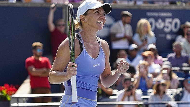 Aug 14, 2022; Toronto, ON, Canada; Simona Halep (ROU) celebrates defeating Beatriz Haddad Maia (not pictured)  in the women's final of the National Bank Open at Sobeys Stadium. Mandatory Credit: John E. Sokolowski-USA TODAY Sports