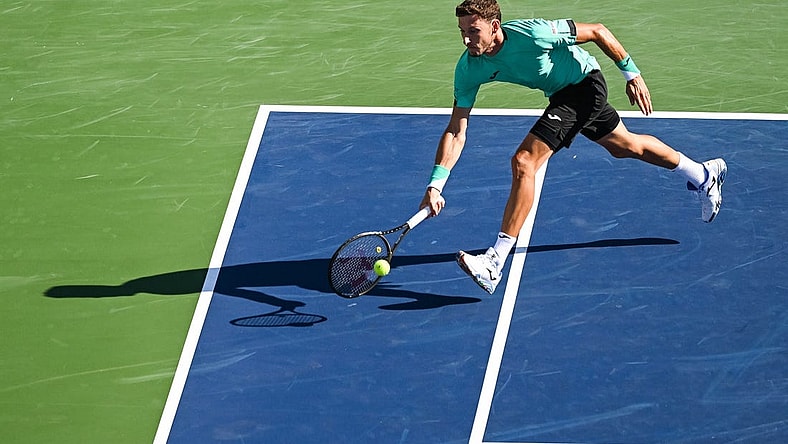 Aug 14, 2022; Montreal, QC, Canada; Pablo Carreno Busta (ESP) hits a shot against Hubert Hurkacz (POL) (not pictured) in the singles final match during during the National Bank Open at IGA Stadium. Mandatory Credit: David Kirouac-USA TODAY Sports