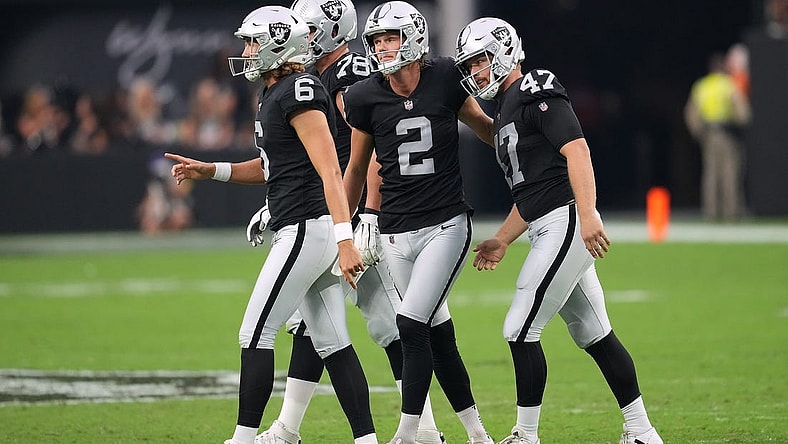 Aug 14, 2022; Paradise, Nevada, USA; Las Vegas Raiders place kicker Daniel Carlson (2) celebrates with Las Vegas Raiders long snapper Trent Sieg (47) and Las Vegas Raiders punter AJ Cole (6) after making a field goal against the Minnesota Vikings during a preseason game at Allegiant Stadium. Mandatory Credit: Stephen R. Sylvanie-USA TODAY Sports