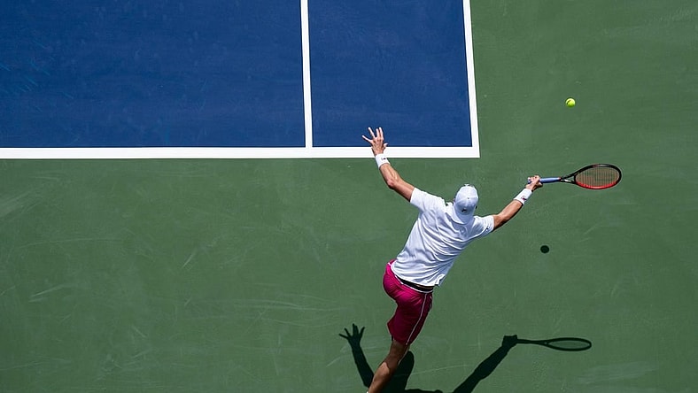 John Isner returns to Benjamin Bonzi during the Western & Southern Open at the Lindner Family Tennis Center in Mason, Ohio Monday, Aug. 15, 2022.
Western Southern Open Day Two Morning 68