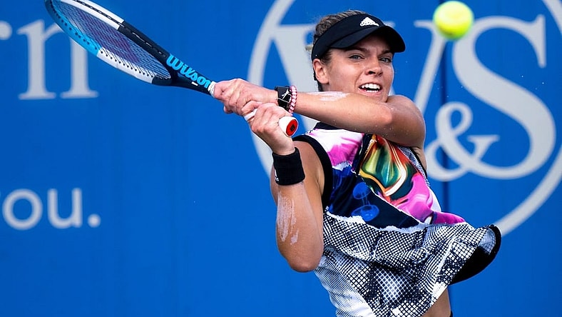 Caty McNally returns to Aliaksandra Sasnovich during the Western & Southern Open at the Lindner Family Tennis Center in Mason, Ohio Monday, Aug. 15, 2022.

Western Southern Open Day Two Morning 83