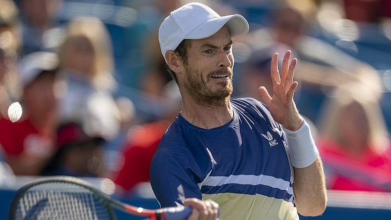 Aug 15, 2022; Cincinnati, OH, USA;  Andy Murray (GBR) returns a shot during his match against Stanislas Wawrinka (SUI) at the Western & Southern at the at the Lindner Family Tennis Center. Mandatory Credit: Susan Mullane-USA TODAY Sports