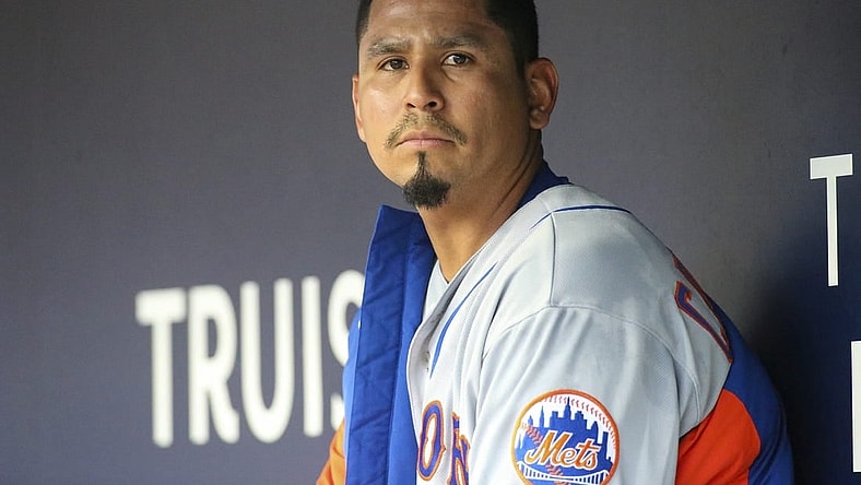 Aug 15, 2022; Atlanta, Georgia, USA; New York Mets starting pitcher Carlos Carrasco (59) in the dugout against the Atlanta Braves in the first inning at Truist Park. Mandatory Credit: Brett Davis-USA TODAY Sports