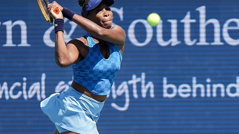 Venus Williams returns the ball during her match against Karolina Pliskova on Center Court during the 2022 Western and Southern Open on Tuesday August 16. Pliskova won the match against Williams.