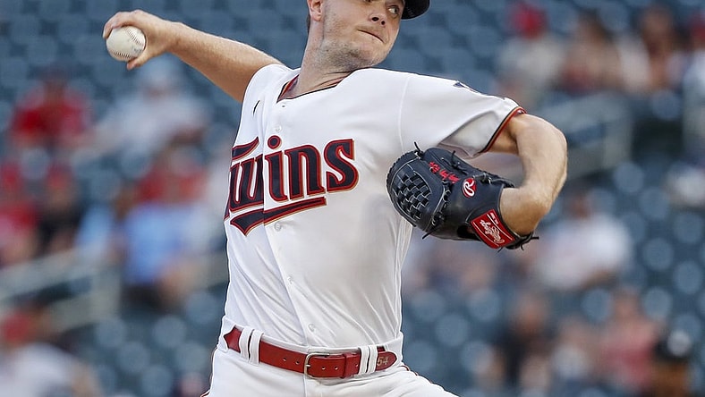 Aug 16, 2022; Minneapolis, Minnesota, USA; Minnesota Twins starting pitcher Sonny Gray (54) throws to the Kansas City Royals in the first inning at Target Field. Mandatory Credit: Bruce Kluckhohn-USA TODAY Sports