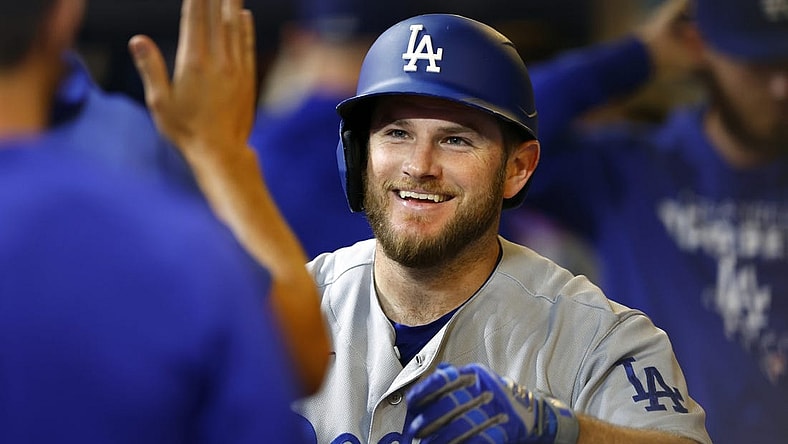 Aug 17, 2022; Milwaukee, Wisconsin, USA;  Los Angeles Dodgers third baseman Max Muncy (13) celebrates after hitting a home run during the seventh inning against the Milwaukee Brewers at American Family Field. Mandatory Credit: Jeff Hanisch-USA TODAY Sports