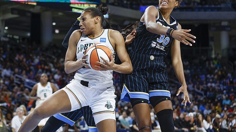 Aug 17, 2022; Chicago, Illinois, USA; New York Liberty forward Betnijah Laney (44) goes to the basket against Chicago Sky forward Azura Stevens (30) during the second half of game one of the first round of the WNBA playoffs at Wintrust Arena. Mandatory Credit: Kamil Krzaczynski-USA TODAY Sports