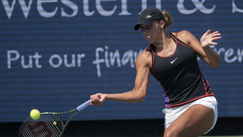 Aug 18, 2022; Cincinnati, OH, USA; Madison Keys (USA) returns a shot during her match against Iga Swiatek (POL) at the Western & Southern Open at the at the Lindner Family Tennis Center. Mandatory Credit: Susan Mullane-USA TODAY Sports