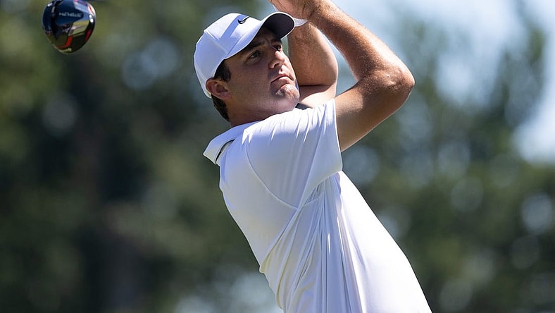 Aug 20, 2022; Wilmington, Delaware, USA; Scottie Scheffler plays his shot from the third tee during the third round of the BMW Championship golf tournament. Mandatory Credit: Bill Streicher-USA TODAY Sports