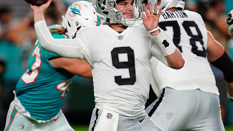Aug 20, 2022; Miami Gardens, Florida, USA; Las Vegas Raiders quarterback Nick Mullens (9) throws a pass against the Miami Dolphins in the second quarter at Hard Rock Stadium. Mandatory Credit: Jim Rassol-USA TODAY Sports