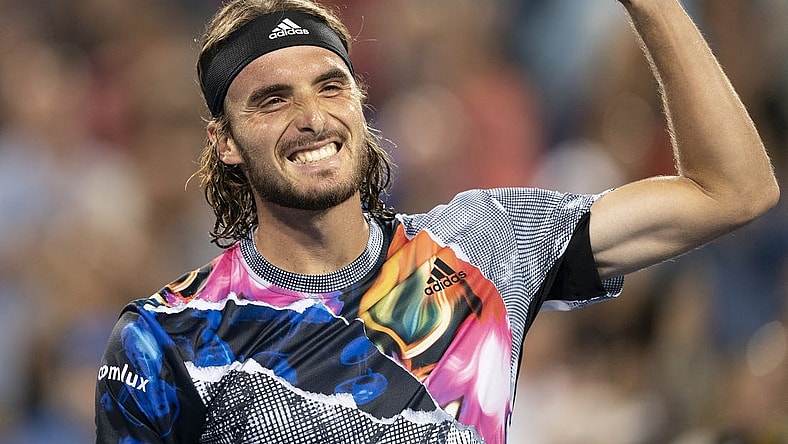 Aug 20, 2022; Cincinnati, OH, USA; Stefanos Tsitsipas (GRE) celebrates after defeating Daniil Medvedev (RUS) at the Western & Southern Open at the Lindner Family Tennis Center. Mandatory Credit: Susan Mullane-USA TODAY Sports