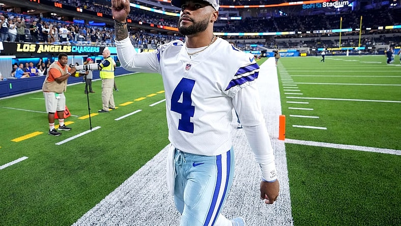 Aug 20, 2022; Inglewood, California, USA; Dallas Cowboys quarterback Dak Prescott (4) walks off the field after a preseason game against the Los Angeles Chargers at SoFi Stadium. Mandatory Credit: Kirby Lee-USA TODAY Sports
