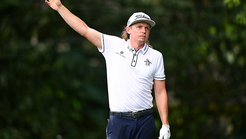 Aug 25, 2022; Atlanta, Georgia, USA; Cameron Smith reacts to his tee shot on the 2nd hole during the first round of the TOUR Championship golf tournament. Mandatory Credit: Adam Hagy-USA TODAY Sports