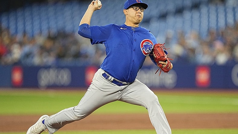 Aug 29, 2022; Toronto, Ontario, CAN; Chicago Cubs starting pitcher Javier Assad (72) pitches to the Toronto Blue Jays during the first inning at Rogers Centre. Mandatory Credit: John E. Sokolowski-USA TODAY Sports