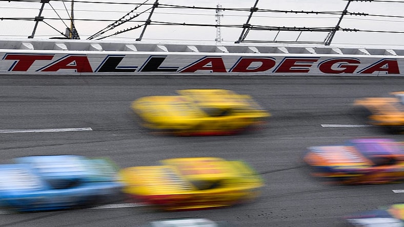Oct 13, 2019; Talladega, AL, USA; View of the safety wall as drivers race around turn four during the 1000Bulbs.com 500 at Talladega Superspeedway. Mandatory Credit: Shanna Lockwood-USA TODAY Sports