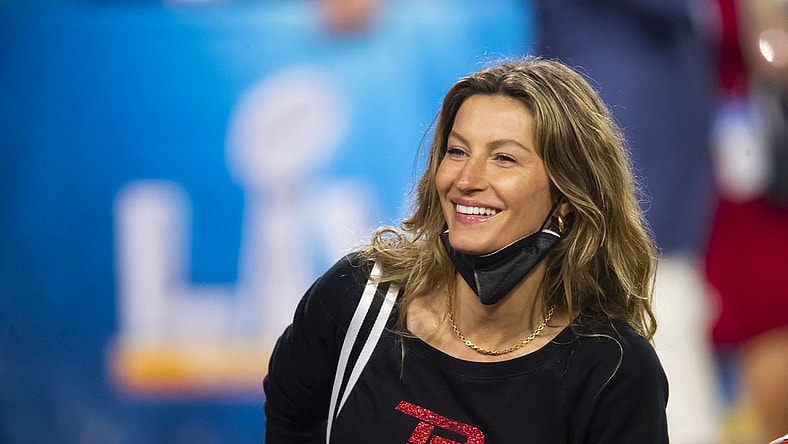 Feb 7, 2021; Tampa, FL, USA;  Gisele Bundchen , wife of Tampa Bay Buccaneers quarterback Tom Brady (not pictured) celebrates after defeating the Kansas City Chiefs in Super Bowl LV at Raymond James Stadium.  Mandatory Credit: Mark J. Rebilas-USA TODAY Sports