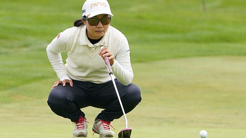 June 13, 2021; Daly City, California, USA; Ayako Uehara lines up her putt on the second hole during the final round of the LPGA MEDIHEAL Championship golf tournament at Lake Merced Golf Club. Mandatory Credit: Kyle Terada-USA TODAY Sports