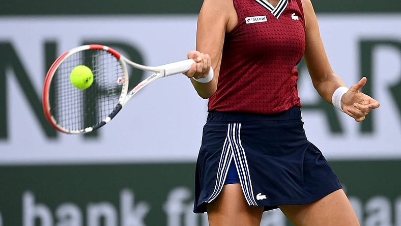 Oct 14, 2021; Indian Wells, CA, USA; Anett Kontaveit (EST) hits a shot against Ons Jabeur (TUN) in their quarterfinal match during the BNP Paribas Open at the Indian Wells Tennis Garden. Mandatory Credit: Jayne Kamin-Oncea-USA TODAY Sports