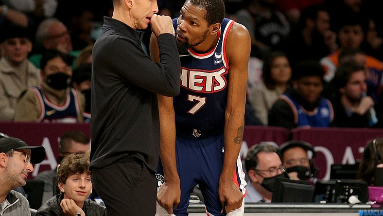 Nov 27, 2021; Brooklyn, New York, USA; Brooklyn Nets head coach Steve Nash talks to forward Kevin Durant (7) during the fourth quarter against the Phoenix Suns at Barclays Center. Mandatory Credit: Brad Penner-USA TODAY Sports