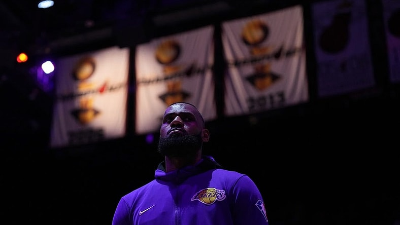 Los Angeles Lakers forward Lebron James (6) stands on the court during the national anthem prior to the game against the Miami Heat at FTX Arena. Mandatory Credit: Jasen Vinlove-USA TODAY Sports
