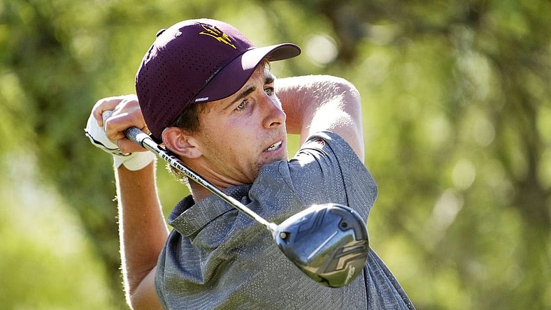 Jun 1, 2022; Scottsdale, Arizona, USA; David Puig of Arizona State plays his the shot on the 12th hole against Mason Nome of Texas during the final round of match play in the NCAA DI Mens Golf Championships at Grayhawk Golf Club - Raptor Course. Mandatory Credit: Rob Schumacher-Arizona Republic

Golf Ncaa Di Mens Golf Championships