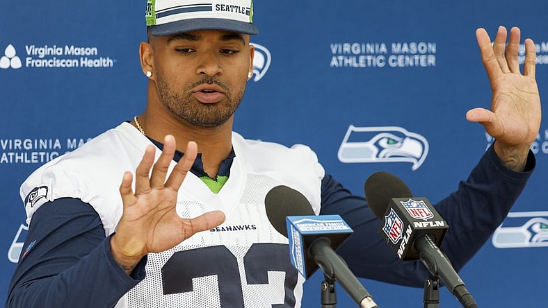 Jun 7, 2022; Renton, Washington, USA; Seattle Seahawks strong safety Jamal Adams (33) talks about past finger injuries during a press conference following a minicamp practice at the Virginia Mason Athletic Center Field. Mandatory Credit: Joe Nicholson-USA TODAY Sports