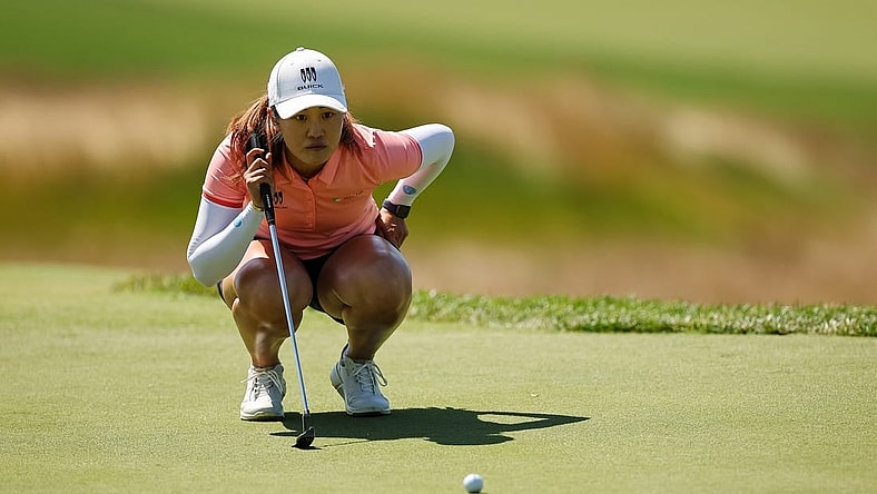 Jun 25, 2022; Bethesda, Maryland, USA; Xiyu Lin lines up a putt on the second green during the third round of the KPMG Women's PGA Championship golf tournament at Congressional Country Club. Mandatory Credit: Scott Taetsch-USA TODAY Sports