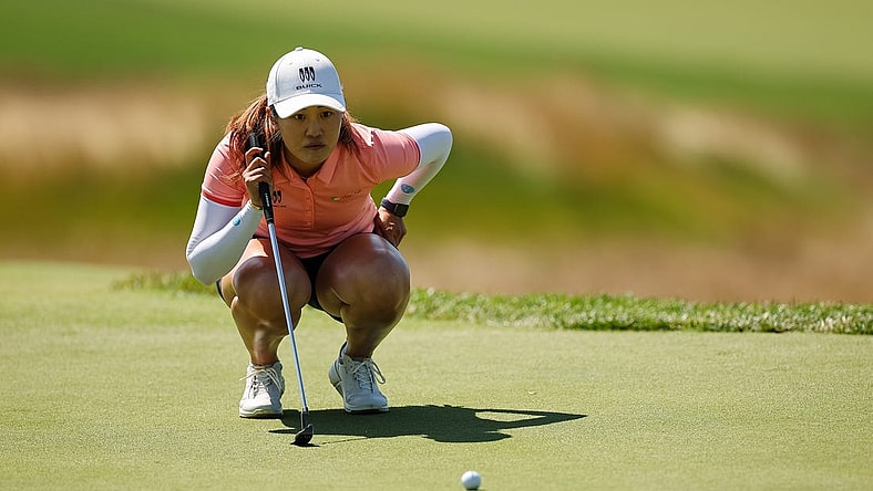 Jun 25, 2022; Bethesda, Maryland, USA; Xiyu Lin lines up a putt on the second green during the third round of the KPMG Women's PGA Championship golf tournament at Congressional Country Club. Mandatory Credit: Scott Taetsch-USA TODAY Sports