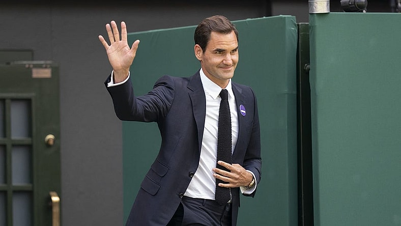 Jul 3, 2022; London, United Kingdom; On the inaugural middle Sunday for play, Wimbledon celebrates 100 years since their move to Church Road and the centenary of Centre Court. Past champions were on court for this special ceremony on day seven at All England Lawn Tennis and Croquet Club. Shown here: Roger Federer (SUI). Mandatory Credit: Susan Mullane-USA TODAY Sports