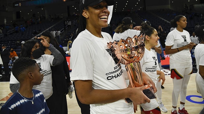 Jul 26, 2022; Chicago, IL, USA;  Las Vegas Aces forward A'ja Wilson (22) with the trophy after they won the Commissioners Cup-Championships with a victory over the Chicago Sky 93-83, at Wintrust Arena. Mandatory Credit: Matt Marton-USA TODAY Sports