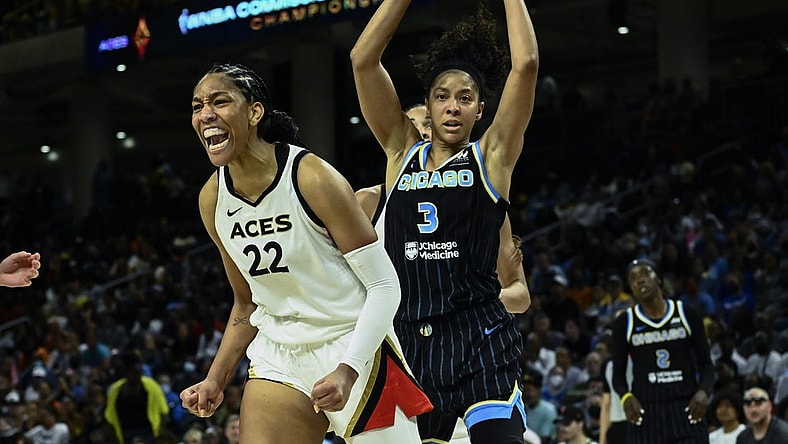 Jul 26, 2022; Chicago, IL, USA;  Las Vegas Aces forward A'ja Wilson (22) yells after scoring against Chicago Sky forward Candace Parker (3) during the second half of the Commissioners Cup-Championships at Wintrust Arena. Mandatory Credit: Matt Marton-USA TODAY Sports