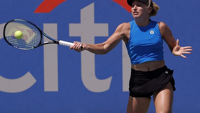 Aug 6, 2022; Washington, DC, USA; Daria Saville (AUS) hits a forehand against Kaia Kanepi (EST) (not pictured) in a women's singles semifinal on day six of the Citi Open at Rock Creek Park Tennis Center. Mandatory Credit: Geoff Burke-USA TODAY Sports