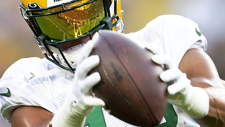 Aug 5, 2022; Green Bay, WI, USA; Lambeau Field is reflected off the visor of Green Bay Packers wide receiver Allen Lazard as he catches a pass at Lambeau Field. Mandatory Credit: Samantha Madar/Green Bay Press Gazette -USA TODAY NETWORK