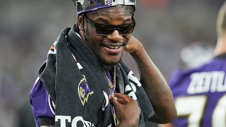 Aug 27, 2022; Baltimore, Maryland, USA;  Baltimore Ravens quarterback Lamar Jackson (8) on the sidelines during the third quarter of the game against the Washington Commanders at M&T Bank Stadium. Mandatory Credit: Jessica Rapfogel-USA TODAY Sports