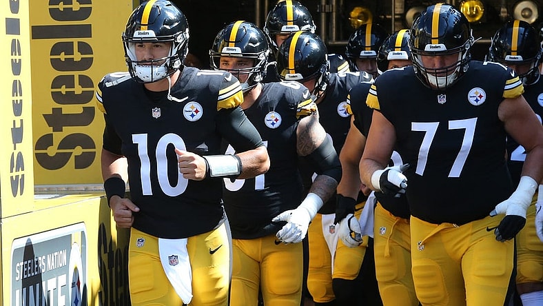 Aug 28, 2022; Pittsburgh, Pennsylvania, USA;  Pittsburgh Steelers quarterback Mitch Trubisky (10) leads the team out onto the field to warm up against the Detroit Lions at Acrisure Stadium. Mandatory Credit: Charles LeClaire-USA TODAY Sports