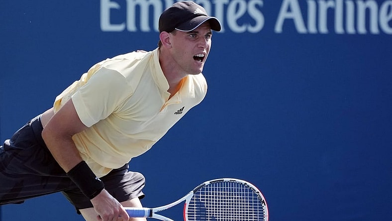 Aug 29, 2022; Flushing, NY, USA;  Dominic Thiem of Austria serves during his match against Pablo Carreno Busta of Spain on day one of the 2022 U.S. Open tennis tournament at USTA Billie Jean King National Tennis Center. Mandatory Credit: Jerry Lai-USA TODAY Sports