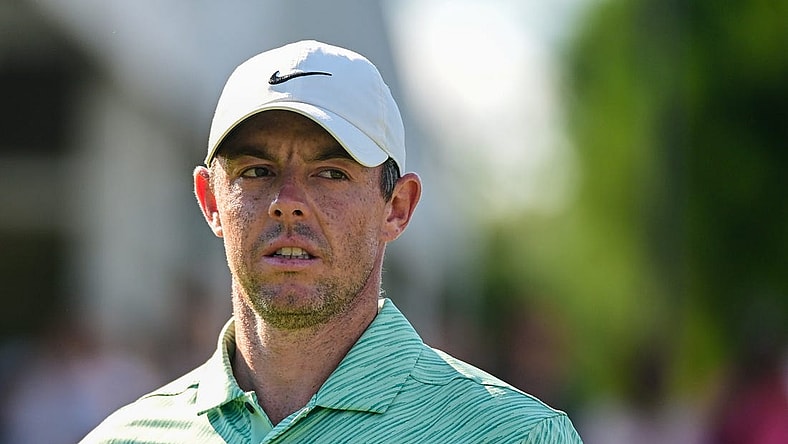 Aug 28, 2022; Atlanta, Georgia, USA; Rory McIlroy looks at the leaderboard on the 17th hole during the final round of the TOUR Championship golf tournament. Mandatory Credit: Adam Hagy-USA TODAY Sports
