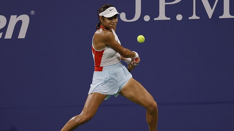 Aug 30, 2022; Flushing, NY, USA; Emma Raducanu (GBR) hits a backhand against Alize Cornet (FRA) (not pictured) on day two of the 2022 U.S. Open tennis tournament at USTA Billie Jean King National Tennis Center. Mandatory Credit: Geoff Burke-USA TODAY Sports