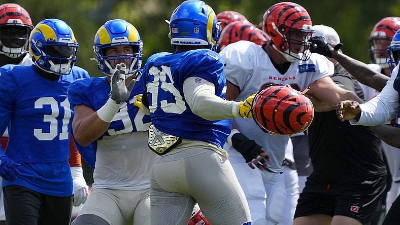 Rams defensive tackle Jonah Williams attempts to hold back Aaron Donald during a brawl during the joint practice against the Bengals.

Syndication The Enquirer