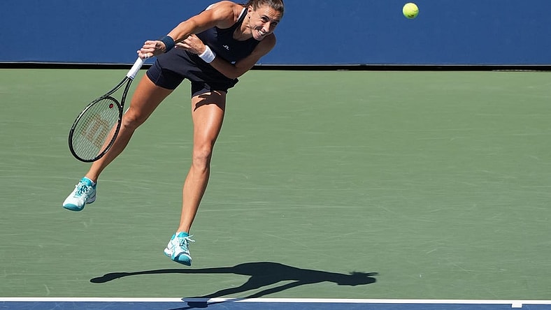 Sep 1, 2022; Flushing, NY, USA; Petra Martic of Croatia serves against Paula Badosa of Spain on day four of the 2022 U.S. Open tennis tournament at USTA Billie Jean King Tennis Center. Mandatory Credit: Jerry Lai-USA TODAY Sports
