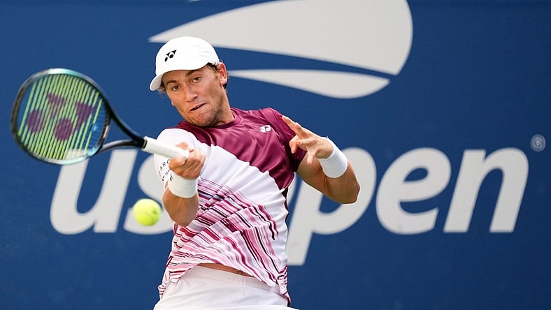 Sep 2, 2022; Flushing, NY, USA; Casper Ruud of Norway hits to Tommy Paul of the United States on day five of the 2022 U.S. Open tennis tournament at USTA Billie Jean King Tennis Center. Mandatory Credit: Danielle Parhizkaran-USA TODAY Sports