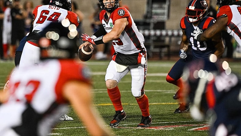 Sep 2, 2022; Montreal, Quebec, CAN; Ottawa Redblacks quarterback Nick Arbuckle (19) gets ready to pass the ball during the second quarter at Percival Molson Memorial Stadium. Mandatory Credit: David Kirouac-USA TODAY Sports